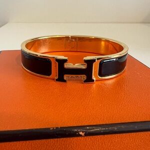 Authentic ** Hermes Clic H Bracelet - Black with Yellow Gold